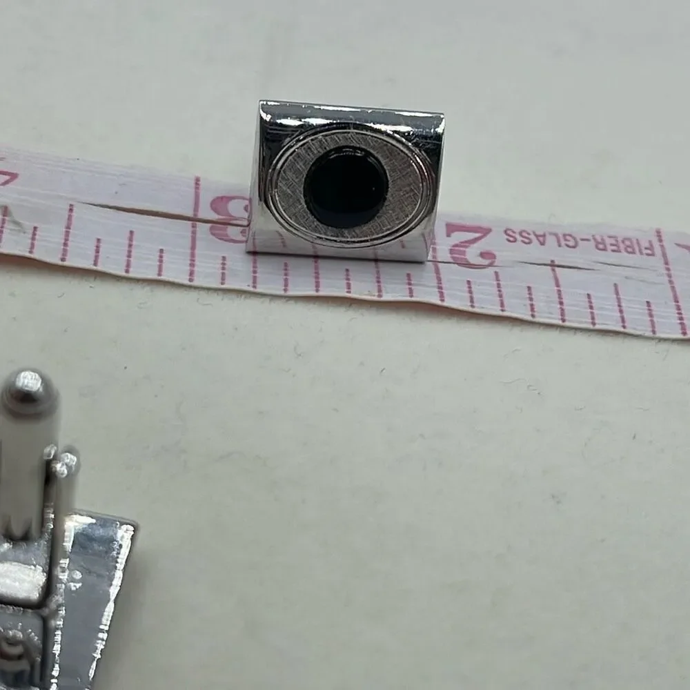 Vintage cuff links silver tone & black glass centers.